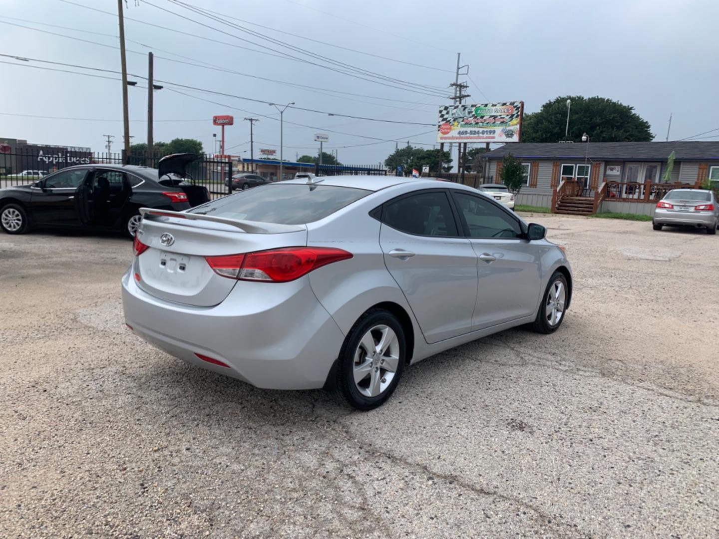 2013 Silver /Black Hyundai Elantra (5NPDH4AE1DH) with an 4 Cylinders E 1.8L MFI DOHC 110 engine, AUTOMATIC transmission, located at 1830 North Belt Line Road, Irving, TX, 75061, (469) 524-0199, 32.834373, -96.993584 - Photo#5